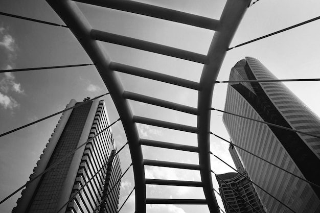 Greyscale architectural bridge in bangkok