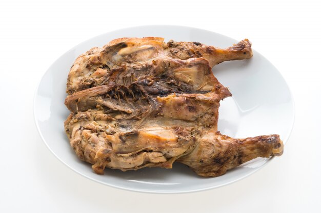 Grilled chicken meat in white plate