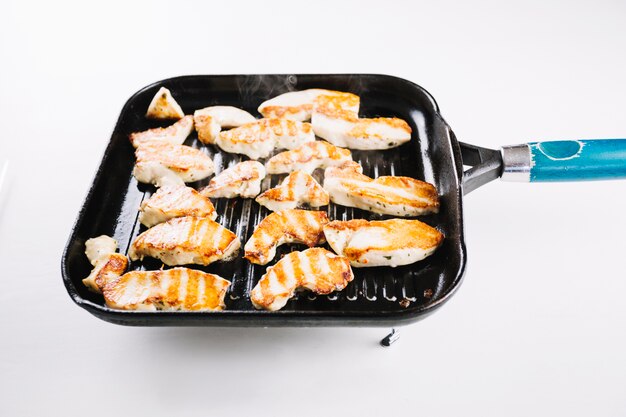 Grilled chicken on pan