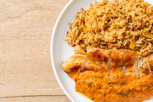 Grilled chicken steak with red curry sauce and rice - muslim food style