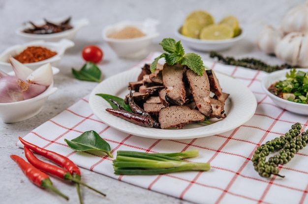 Grilled Liver Slices with sliced ÃÂÃÂ¢ÃÂÃÂÃÂÃÂÃÂÃÂ¢ÃÂÃÂÃÂÃÂlime, carrots, chili, spring onions, and mint.