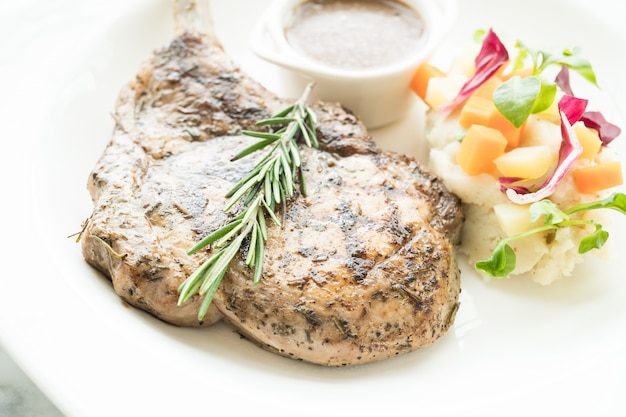 Grilled pork chop steak