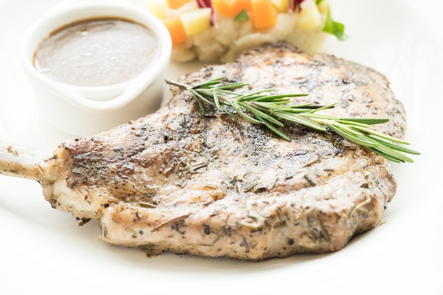 Free photo grilled pork chop steak