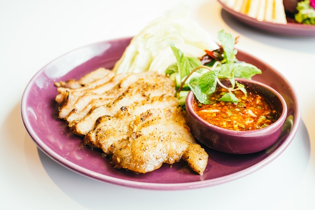 Grilled pork neck meat with spicy sauce