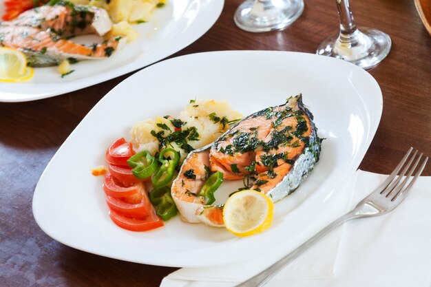 Grilled salmon fish in plate