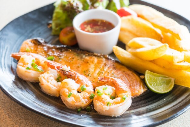 Grilled salmon and prawn steak