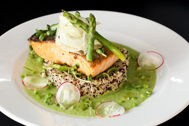 Grilled salmon with asparagus and mushy peas