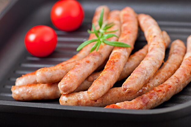 grilled sausages with tomatoes