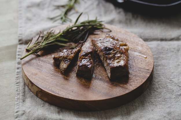 Grilled steak on table