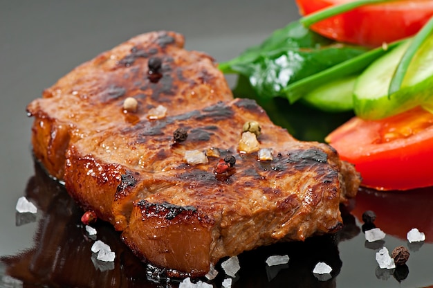 Grilled steak and vegetables