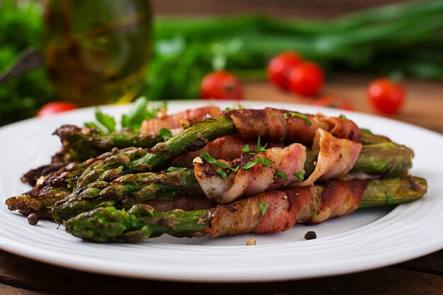 Grilled violet asparagus wrapped with bacon