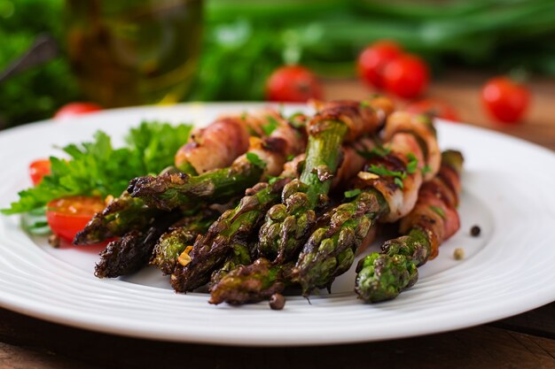 Grilled violet asparagus wrapped with bacon