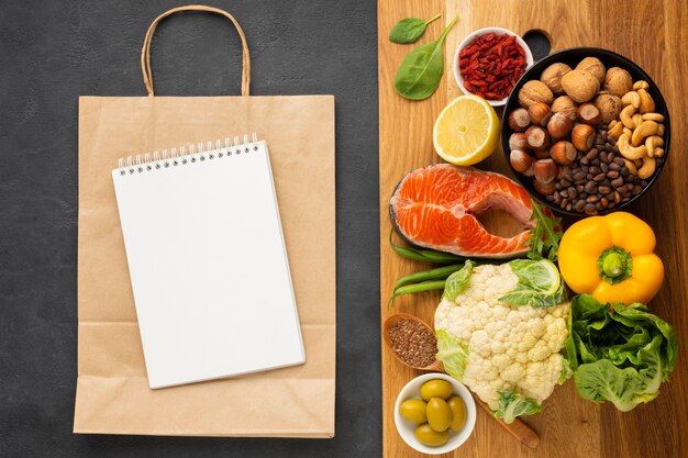 Groceries on cutting board with copy space