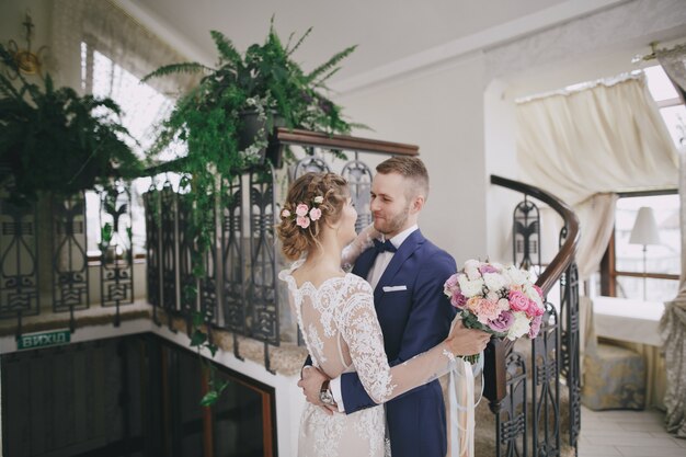 groom and bride in a hotel