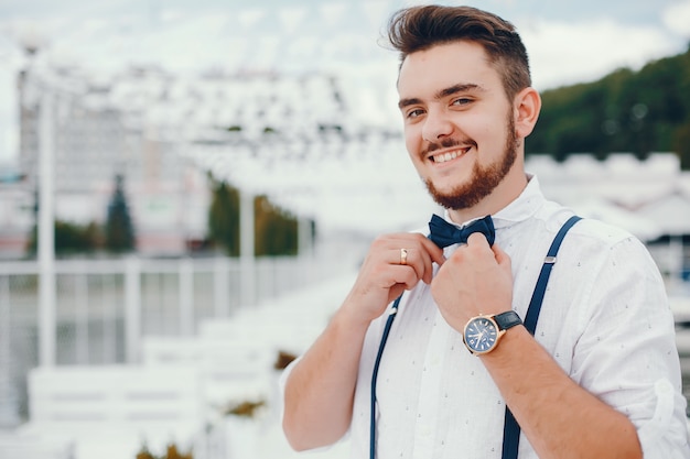 Groom dressed in a white shirt