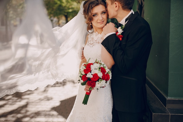 Groom kisses bride