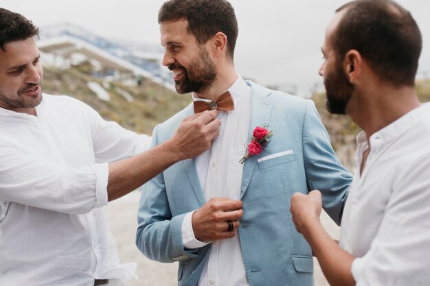 Groom talking with his best men