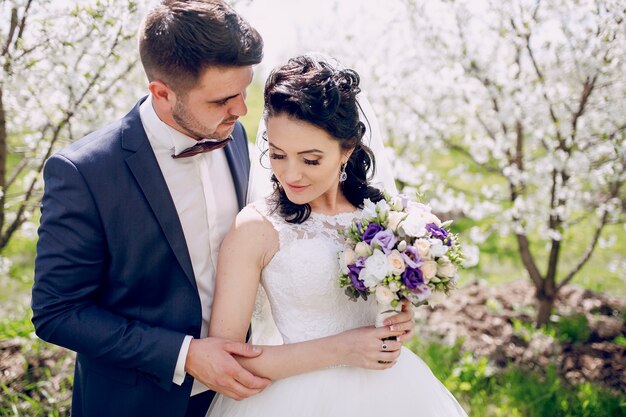 Groom touching his wife's arm