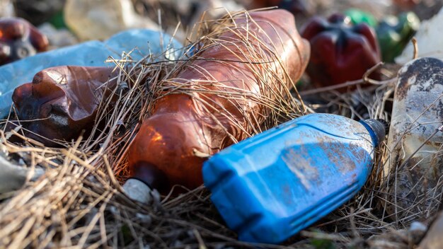 Ground littered with plastic bottles