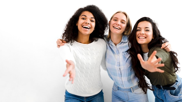 Group of adult women smiling together