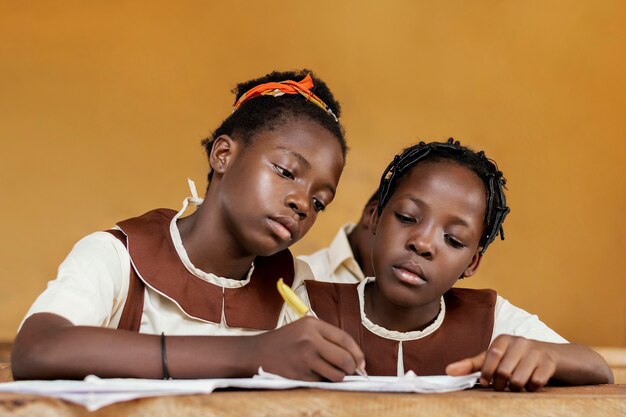 Group of african kids learning together