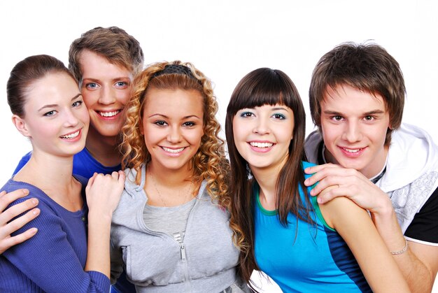 Group of attractive young adult people - isolated on white