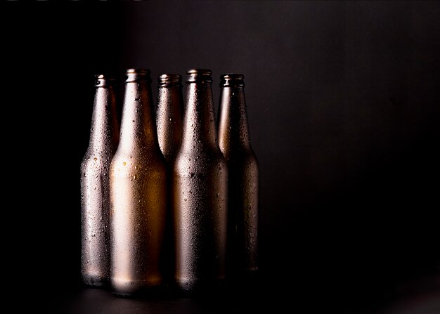 Group of black beer bottles