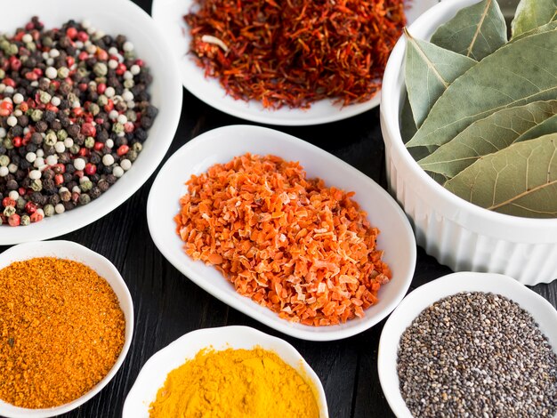 Group of bowls full of spices