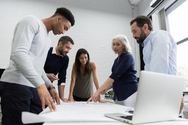 Group of business people discussing financial plan