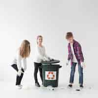 Free photo group of children recycling together