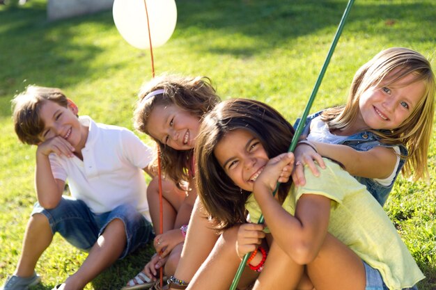 Group of childrens having fun in the park.