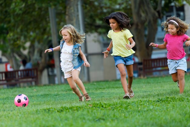 Group of childrens having fun in the park.