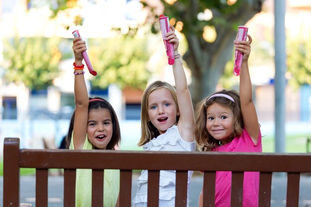 Group of childrens having fun in the park.