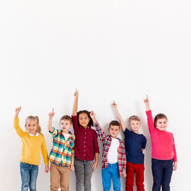 Group of childrens pointing