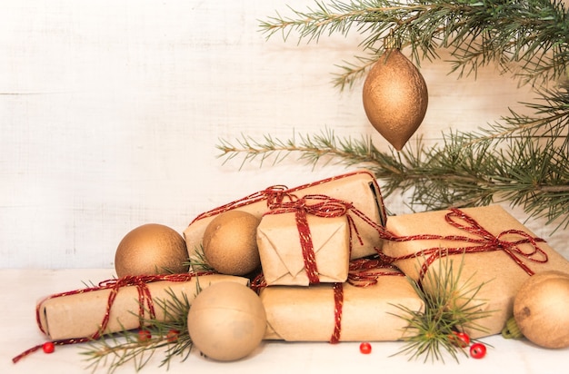 Group of Christmas gifts on rustic wood