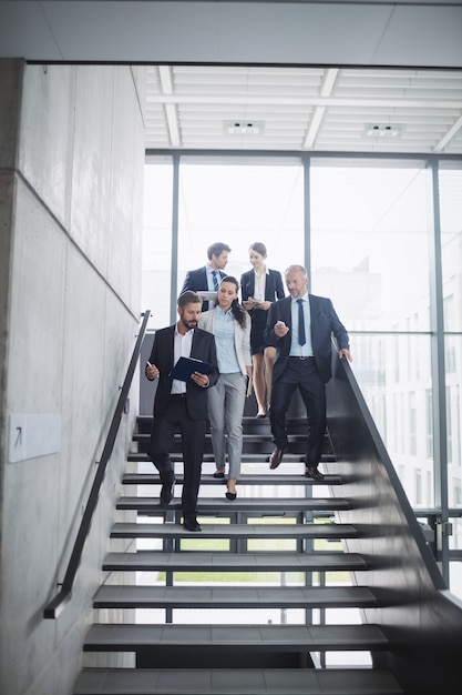 Group of confident businesspeople in office