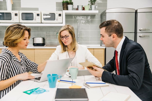 Group of coworkers discussing business