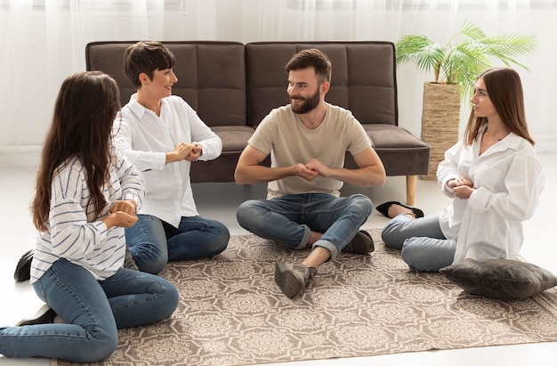 Group of deaf people communicating through sign language