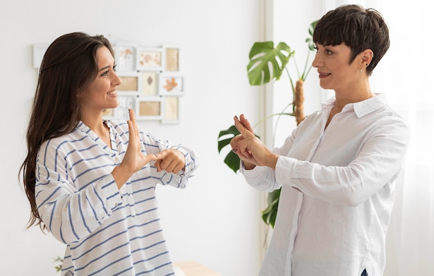 Group of deaf people communicating through sign language