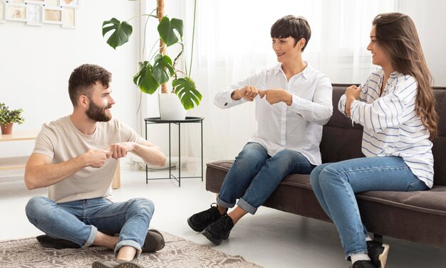 Group of deaf people communicating through sign language