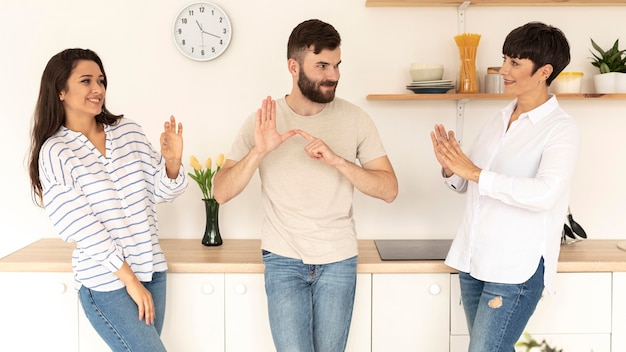Group of deaf people communicating through sign language