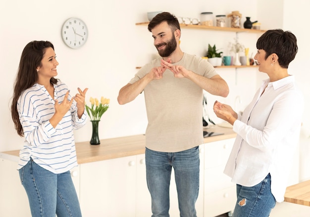 Group of deaf people communicating through sign language