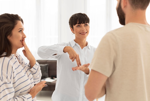 Group of deaf people communicating through sign language