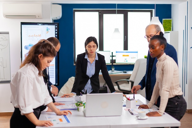 Group of diverse businesspeople meeting brainstorm ideas about new paperwork finance project