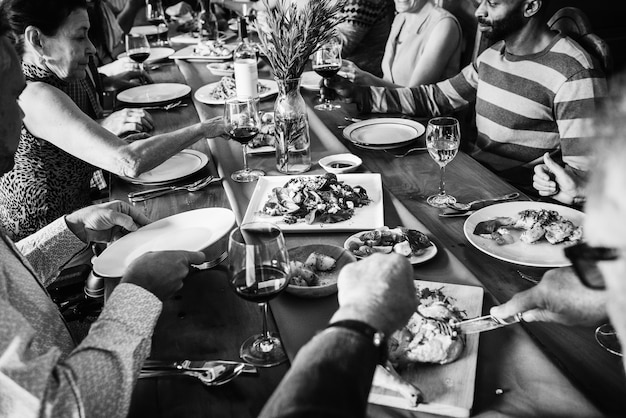 Group of diverse friends having a dinner together