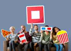 Free photo group of diverse friends holding movie emoticons