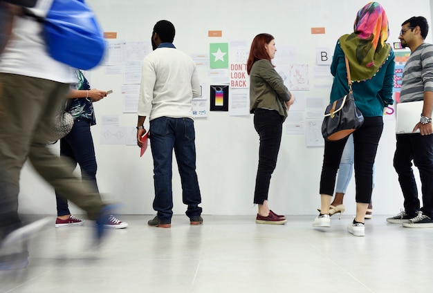 Group of diverse people attending startup business course