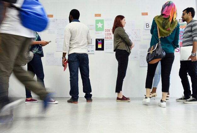 Group of diverse people attending startup business course