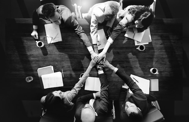 Group of diverse people with joining hands teamwork