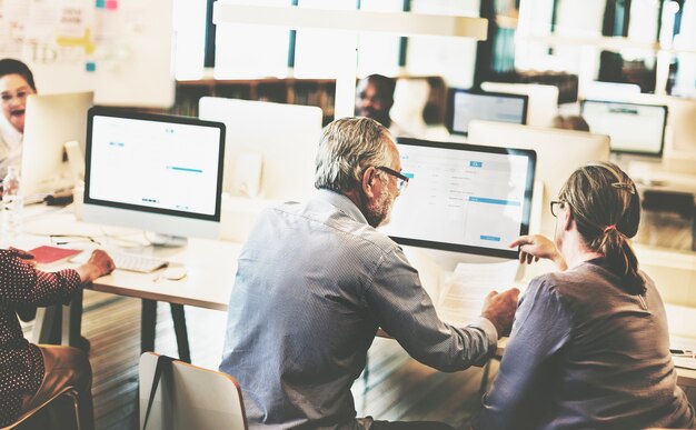 Group of diverse senior adults in computer class